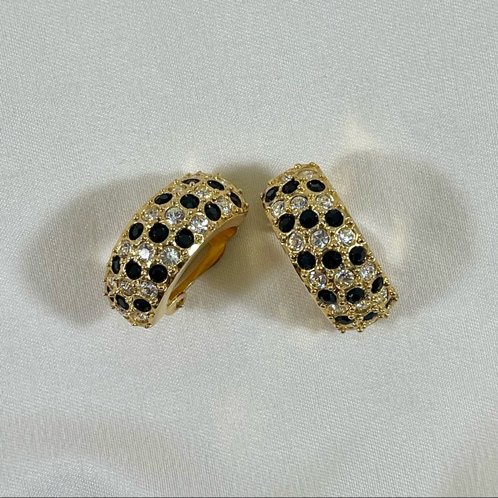 Vintage elegant 80s half hoops; gold plated by Roman. Great vintage condition.